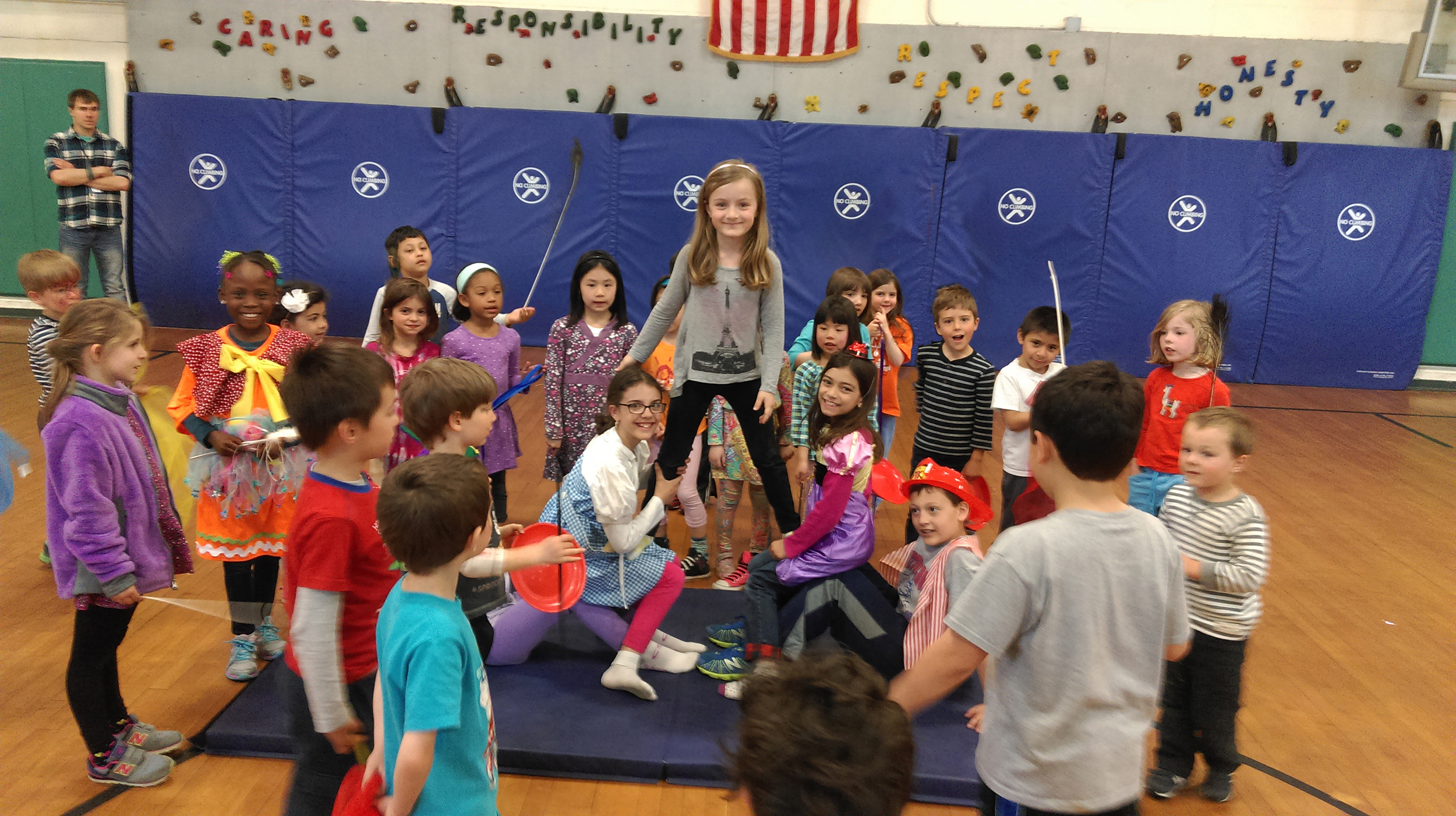 Kids proudly posing together during a circus class